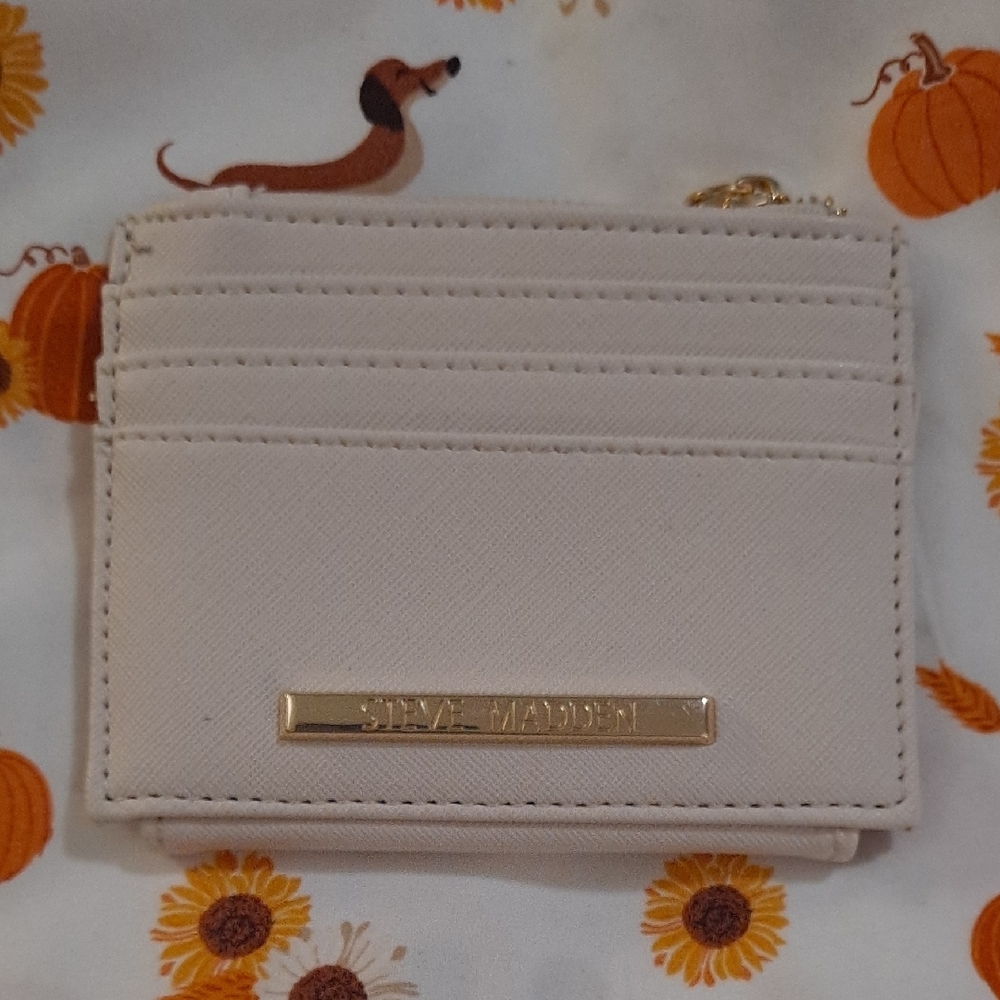 Like New! Classic Steve Madden cream faux leather card holder with gold accents